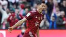 Robert Lewandowski - Bayern Munchen sukses merebut poin penuh kala bertandang ke markas Union Berlin dalam lanjutan Bundesliga.  Robert Lewandowski menyumbang dua diantara lima gol kemenangan Die Roten. (AFP/Christof Stache)