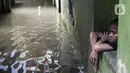 Pemukiman warga di Kebon Pala, Kampung Melayu, Jakarta Timur terendam air sejak Kamis (30/11/2023). (Liputan6.com/Faizal Fanani)