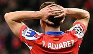 Pemain depan Atletico Madrid asal Argentina bernomor punggung 19, Julian Alvarez, bereaksi selama pertandingan leg kedua babak 16 besar Liga Champions UEFA antara Club Atletico de Madrid dan Real Madrid CF di stadion Metropolitano di Madrid, Kamis dini hari WIB (13-3-2025). (JAVIER SORIANO/AFP)