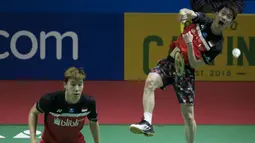 Aksi ganda putera Indonesia, Kevin Sanjaya / Marcus Gideon saat menghadapi Li Junhui/Liu Yuchen pada semifinal Indonesia Open 2019. ( Bola.com/Peksi Cahyo )
