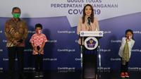Dirjen P2P Achmad Yurianto dan Duta Adaptasi Kebiasaan Baru Dokter Reisa Broto Asmoro menghadiri sesi Hari Anak Nasional 2020 di Media Center BNPB, Jakarta. Kamis (23/7/2020). (Dok Tim Komunikasi Komite Penanganan COVID-19 dan Pemulihan Ekonomi Nasional/BNPB)