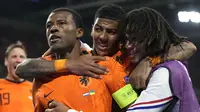 Goerginio Wijnaldum. Gelandang Timnas Belanda berusia 30 tahun ini dipercaya menjadi kapten saat mengalahkan Ukraina 3-2, 14 Juni 2021. Pada 2012 ia tak masuk skuat Belanda di Euro 2016, sedangkan pada Euro 2016 Tim Oranye tidak lolos ke putaran final. (Foto: AP/Pool/Peter Dejong)