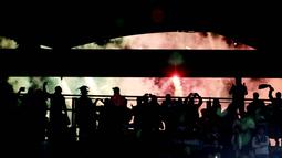 Olimpico yang merupakan salah satu stadion tertua di dunia ini awalnya bernama Stadio dei Cipressi pada tahun 1937. Namun Desember 1950, stadion ini mengalami renovasi dan berubah nama menjadi Stadio dei Centomila yang diresmikan 1953. (AFP/FIlippo Monteforte)