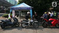 Sebelumnya, uji coba tilang kendaraan yang tak lolos uji emisi pada 25 Agustus 2023 ini telah disampaikan Pemprov DKI melalui Dinas Lingkungan Hidup (DLH) DKI Jakarta. (Liputan6.com/Johan Tallo)