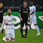 Real Madrid meraih hasil imbang 2-2 kontra Borussia Monchengladbach pada laga kedua Grup B Liga Champions di Borussia-Park, Rabu (28/10/2020) dini hari WIB. (AFP/Ina Fassbender)