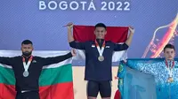 Lifter muda Indoensia, Rizki Juniansyah, berhasil menyabet medali emas IWF World Champinship 2022 di Bogota, Kolombia, Sabtu (10/12/2022) pagi WIB.