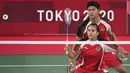 Pasangan ganda campuran Indonesia, Paveen Jordan dan Melati Oktavianti harus menerima kekalahan pertama setelah ditundukkan pasangan Jepang, Yuta Watanabe dan Arisa Higashino. Namun kekalahan ini tak halangi Indonesia untuk lanjut ke babak selanjutnya. (Foto: AFP/Alexander Nemenov)