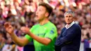 Ekspresi pelatih Real Betis Quique Setien saat anak asuhnya menghadapi Atletico de Madrid pada pertandingan Liga Spanyol di Stadion Wanda Metropolitano, Madrid, Spanyol, 7 Oktober 2018. Setien menjadi pelatih Barcelona menggantikan Ernesto Valverde yang dipecat. (GABRIEL BOUYS/AFP)