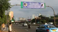 Sebuah spanduk uji coba penghapusan kawasan 3 in 1 terpasang di jalan Gatot Subroto, Jakarta, Minggu (3/4/2016). Uji coba penghapusan kawasan 3 in 1 akan dilakukan pada hari selasa (5/4) selama sepekan. (Liputan6.com/Herman Zakharia)