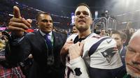Tom Brady - Bintang american football ini merupakan salah satu atlet terpopuler di Amerika Serikat. Pria berusia 44 tahun itu menghasilkan 37.000 dollar atau setara Rp 529,6 juta per menit pada tahun 2021. (AFP/Jamie Squire)