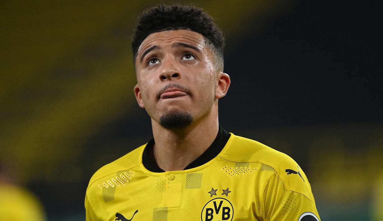 Manchester United akhirnya mendapatkan jasa Jadon Sancho pada musim panas lalu dari Borussia Dortmund. Ia merupkan pemain muda yang sangat potensial. Namun, Sancho belum mampu memberikan penampilan terbaiknya di Old Trafford. (AFP/Ina Fassbender)