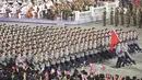 Pasukan Korea Utara berparade selama perayaan ulang tahun ke-73 negara itu di Lapangan Kim Il Sung di Pyongyang, Kamis (9/9/2021). Parade militer Korea Utara itu merupakan yang pertama sejak Joe Biden menjabat sebagai presiden AS. (Korean Central News Agency/Korea News Service via AP)