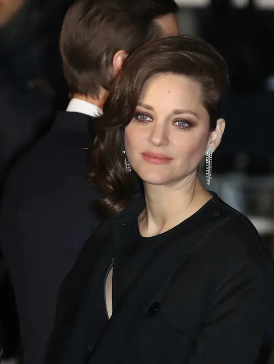 Diduga menjadi penyebab keretakkan rumah tangga Jolie dan Pitt, Marion menampik lewat sebuah pernyataan di Instagram yang mengatakan bahwa dirinya hanya mencintai kekasihnya, Guillaume Canet , yang sudah dipacari selama bertahun-tahun. (AFP/Bintang.com)