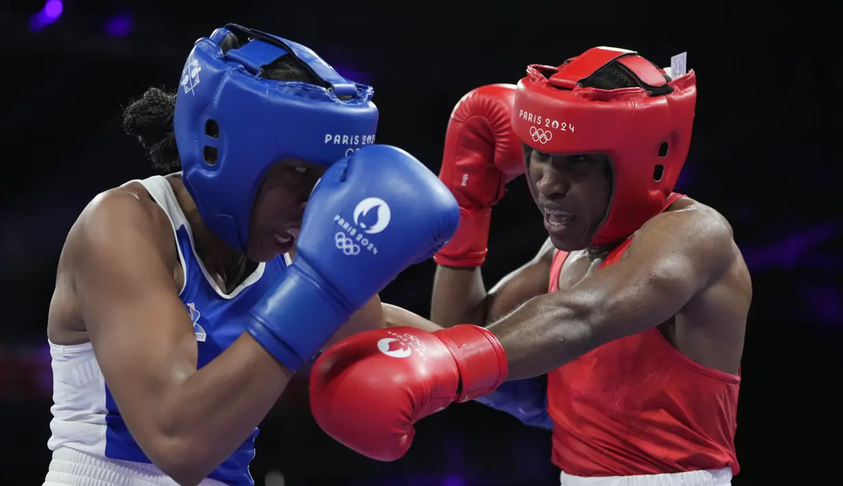 Kontingen pengungsi pertama kali berkompetisi di Olimpiade Rio 2016 dan diperuntukkan bagi orang-orang yang terpaksa mengungsi di seluruh dunia. (AP Photo/Ariana Cubillos)