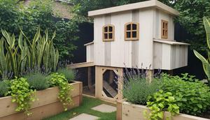 Kandang Integrasi Taman Filter, Estetika dan Penyaring Bau Alami. Foto: Gemini