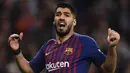 Luis Suarez pernah menjadi salah satu andalan lini serang Barcelona selain Messi. Suarez telah mencetak 195 gol dan 113 assist dari 283 laga untuk Blaugrana. Sayangnya ia harus dijual ke Atletico Madrid dengan harga murah, disinyalir karena kedatangan Ronald Koeman. (Foto: AFP/Oscar Del Pozo)