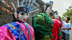 Menurutnya, keberadaan ondel-ondel sebagai salah satu kebudayaan Betawi wajib dirawat dengan baik dan harus tetap lestari. (Liputan6.com/Angga Yuniar)