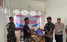 Prajurit Satgas Yonif 511/DY Gelar Pembagian Kelambu Malaria Massal di Pedalaman Papua