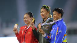 Ia mengungguli wakil Vietnam, Hoang Thanh Giang, yang meraih medali perak, serta atlet Filipina Sarah Dequinan yang harus puas membawa pulang medali perunggu. (Bola.com/Bagaskara Lazuardi)