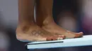 Jennifer Abel - Atlet asal Kanada ini memiliki tato cincin Olimpiade bagian kakinya. Dia pernah menyabet medali perunggu di Olimpiade London 2012. (Foto:AFP/Odd Andersen)