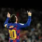 Striker Barcelona, Lionel Messi, merayakan gol ke gawang Granada (LLUIS GENE / AFP)
