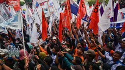 Ribuan buruh dari berbagai elemen serikat pekerja akan menggelar aksi unjuk rasa pada peringatan Hari Buruh Internasional (May Day) 2025 di depan Kantor Gubernur Jawa Timur, Jalan Pahlawan No. 110, Surabaya, Jawa Timur, Kamis (1/5/2025). (Juni KRISWANTO/AFP)