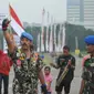 Kopral Bagyo koprol keliling Monas. (Liputan6.com/ Gempur M. Surya)