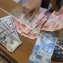 Rupiah Melemah Terhadap Dolar AS, Ini Pemicunya