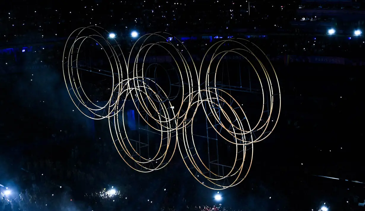 Amerika Serikat berhasil keluar sebagai juara umum Olimpiade Paris 2024. Amerika Serikat berhasil mengungguli China. (Julie SEBADELHA/AFP)