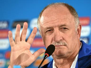 Senin (14/7/14), Luiz Felipe Scolari resmi mengundurkan diri sebagai pelatih Brasil. (AFP PHOTO/Evaristo SA)