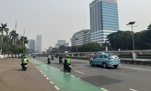 Situasi arus lalu lintas menuju Gedung DPR RI. (Liputan6.com/Radityo Priyasmoro)