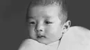 Putra Mahkota Akihito ketika ia berusia tiga bulan, Tokyo, Jepang, 23 Maret 1934. Akihito menjabat sebagai Kaisar Jepang selama 31 tahun. (JIJI PRESS/AFP)