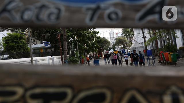 FOTO: Kawasan Kota Tua Jakarta Masih Jadi Destinasi Favorit Warga Beribur