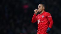 Thiago Alcantara - Thiago Alcantara menjadi nama yang ramai dibicarakan pada bursa transfer pemain jelang musim 2020-2021. Gelandang Bayern Munchen itu dikaitkan dengan Liverpool dan Manchester United. (AFP/Ronny Hartmann)