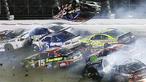 Pebalap Austin Dillon mengalami tabrakan hebat saat berlomba di Coke Zero 400 yang masuk dalam NASCAR Sprint Cup Series yang berlangsung di Daytona International Speedway, AS. Senin (6/7/2015) WIB. (AP Photo)