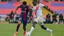 Tiga gol Barca, dua di antaranya dilesakkan Pedri dan satunya dicetak Robert Lewandowski. (MANAURE QUINTERO / AFP)