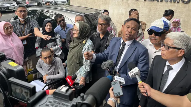 Pengacara dari Roy Suryo, Ahmad Khozinudin di Polda Metro Jaya.