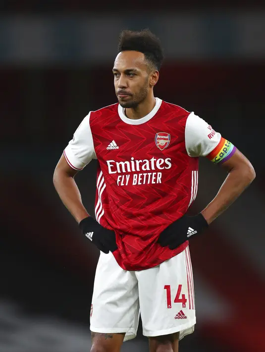 Ekspresi pemain Arsenal Pierre-Emerick Aubameyang usai mencetak gol bunuh diri saat melawan Burnley pada pertandingan Liga Premier Inggris di Stadion Emirates, London, Inggris, Minggu (13/12/2020). Arsenal kalah 0-1. (Catherine Ivill/Pool via AP)