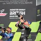 Tiga pembalap yang naik podium MotoGP Inggris 2021. Alex Rins, Aleix Espargaro, dan Fabio Quartararo (Adrian DENNIS / AFP)