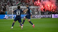 Pemain Paris Saint-Germain (PSG) merayakan keberhasilan mereka mengalahkan Arsenal melalui drama adu penalti di final Liga Champions 2025/2026 di Puskas Arena, Hungaria, Sabtu (30/5/2026). (AP Photo/Denes Erdos)