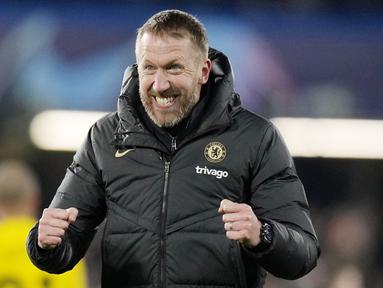 Ekspresi kebahagiaan pelatih Chelsea, Graham Potter, setelah menaklukkan Borussia Dortmund pada leg kedua 16 besar Liga Champions di Stadion Stamford Bridge, Rabu (8/3/2023). (AP Photo/Alastair Grant)