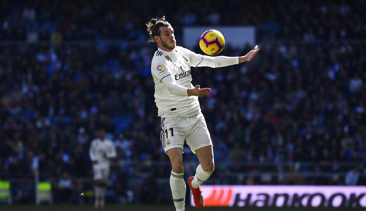 1. Gareth Bale - Kapten timnas Wales tersebut dijuluki sebagai “Bolt”. Julukan tersebut didapatkan usai mempermalukan bek Barcelona, Marc Bartra di final Copa Del Rey 2014. (AFP/Gabriel Bouys)