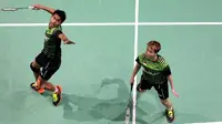 Tontowi Ahmad/Liliyana Natsir gagal menjadi juara Grup B di ajang BWF Super Series Finals 2017 setelah kalah dari ganda Hong Kong, Wang Yilyu/Huang Dong Ping, 9-21, 21-11, 11-21, Jumat (15/12/2017). (PBSI)