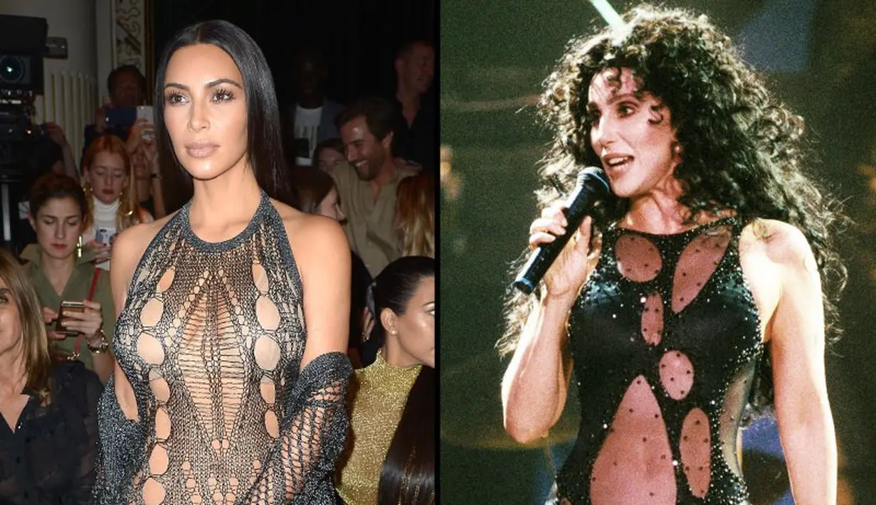 Bahkan Kim Kardashian tetap meniru gaya Cher saat hadiri Paris Fashion Week 2016. (Getty Images/USWeekly)