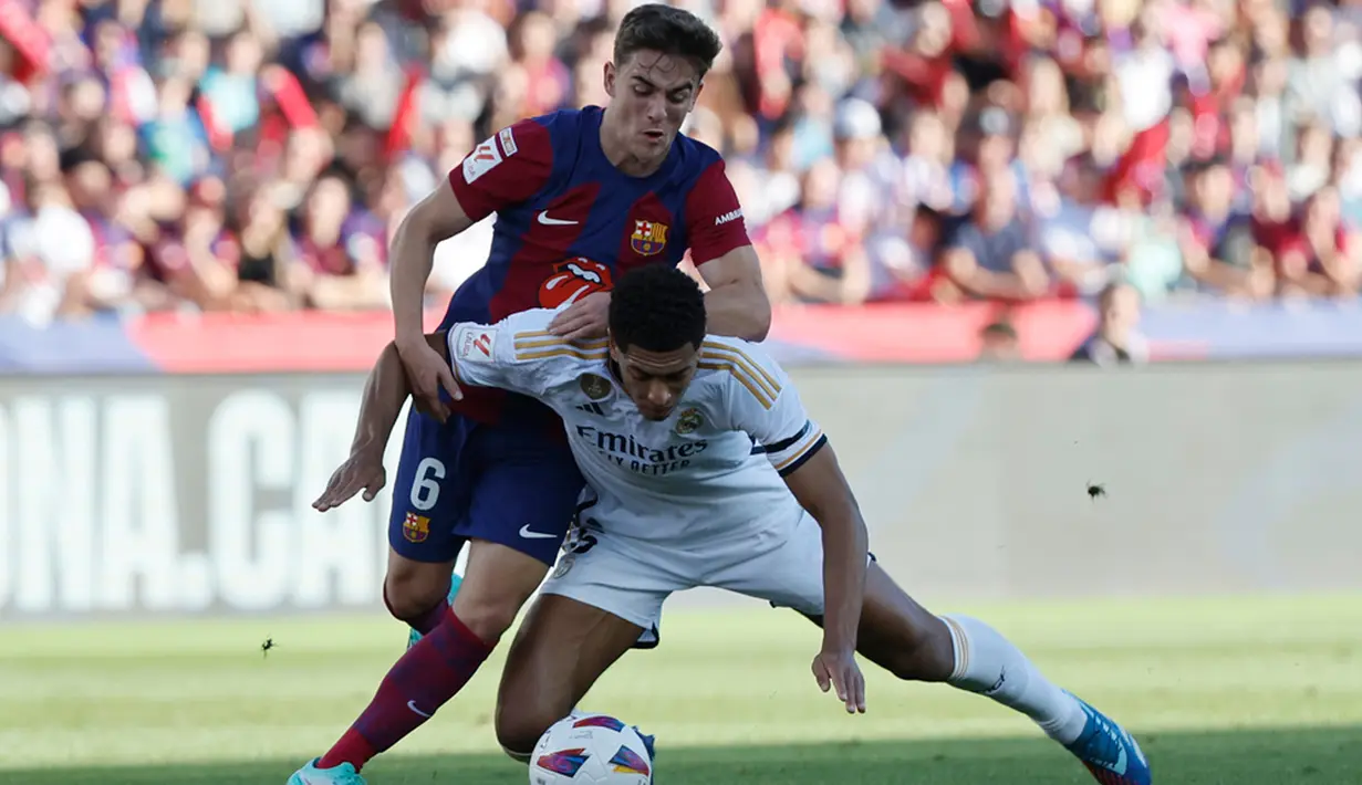 Jude Bellingham tampil gemilang pada duel bergengsi Barcelona Vs Real Madrid. (AP Photo/Joan Monfort)