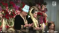 Busana pengantin resepsi malam pernikahan Kahiyang Ayu-Bobby Nasution (Foto: Liputan6.com)