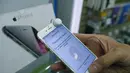 iPhone 6 mulai dipasarkan di Moskow dan sejumlah kota besar lain di Rusia pada Jumat, (26/9/2014). (REUTERS/Maxim Shemetov)