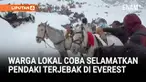 Ratusan pendaki terperangkap badai salju di lereng timur Gunung Everest, Tibet.