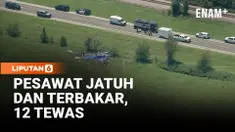 Sebuah pesawat yang mengangkut penumpang untuk kegiatan terjun payung jatuh dan terbakar di dekat Bandara Memorial Butler, Missouri, Amerika Serikat, Minggu (15/6). Seluruh 12 orang yang berada di dalam pesawat dilaporkan tewas dalam kecelakaan terse...