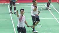 Ekspresi Hafizh Briliansyah Prawiranegara atlet bulutangkis Indonesia usai lolos ke babak final di Asian Paragames 2018  di Istora Senayan, Minggu (7/10/2018).  (Bola.com/Peksi Cahyo)
